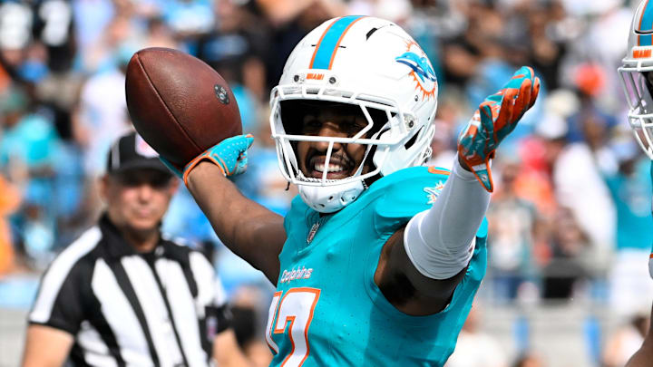 Oct 5, 2025; Charlotte, North Carolina, USA; Miami Dolphins wide receiver Jaylen Waddle (17) celebrates after scoring a touchdown in the fourth quarter at Bank of America Stadium. Mandatory Credit: Bob Donnan-Imagn Images