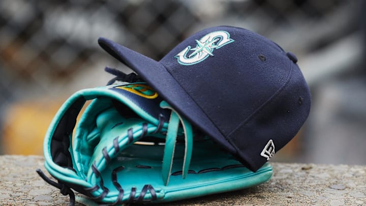 May 12, 2018; Detroit, MI, USA; Hat and glove of Seattle Mariners center fielder Dee Gordon (9) sits in dugout during the third inning against the Detroit Tigers at Comerica Park. Mandatory Credit: Rick Osentoski-Imagn Images