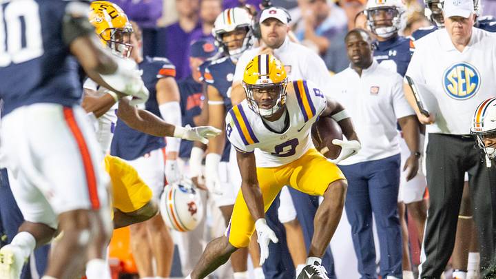 LSU Tigers wide receiver Malik Nabers (8) runs the ball after the catch as the LSU Tigers take on the Auburn Tigers at Tiger Stadium in Baton Rouge, Louisiana, Saturday, Oct. 14, 2023.