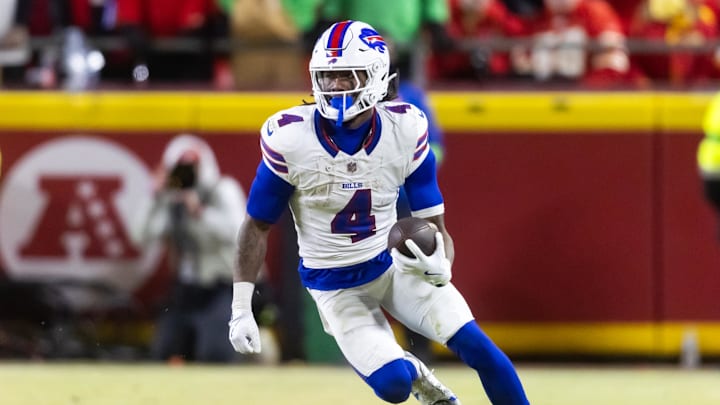 Jan 26, 2025; Kansas City, MO, USA; Buffalo Bills running back James Cook (4) against the Kansas City Chiefs during the AFC Championship game at GEHA Field at Arrowhead Stadium. Mandatory Credit: Mark J. Rebilas-Imagn Images