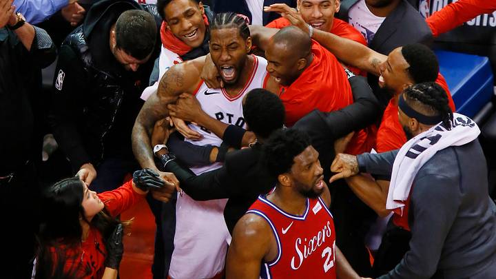 Kawhi Leonard and the Raptors celebrate his series-clinching shot.
2019-05-12 Kawhi Leonard2 Kawhi Leonard and the Raptors celebrate his series-clinching shot.
2019-05-12 Kawhi Leonard2