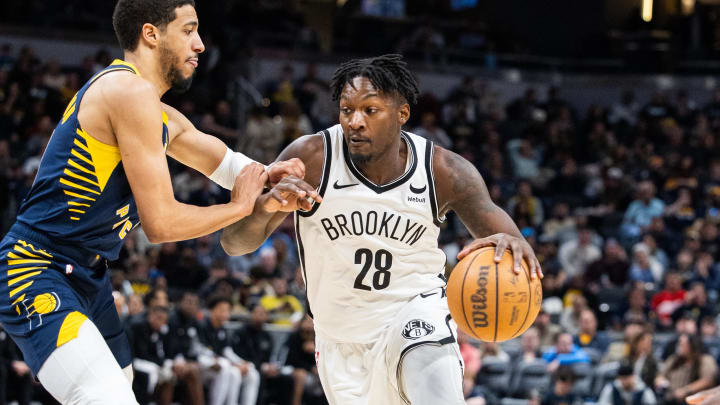 Apr 1, 2024; Indianapolis, Indiana, USA; Brooklyn Nets forward Dorian Finney-Smith (28) dribbles the ball while Indiana Pacers guard Tyrese Haliburton (0) defends in the second half at Gainbridge Fieldhouse. Mandatory Credit: Trevor Ruszkowski-USA TODAY Sports Apr 1, 2024; Indianapolis, Indiana, USA; Brooklyn Nets forward Dorian Finney-Smith (28) dribbles the ball while Indiana Pacers guard Tyrese Haliburton (0) defends in the second half at Gainbridge Fieldhouse. Mandatory Credit: Trevor Ruszkowski-USA TODAY Sports