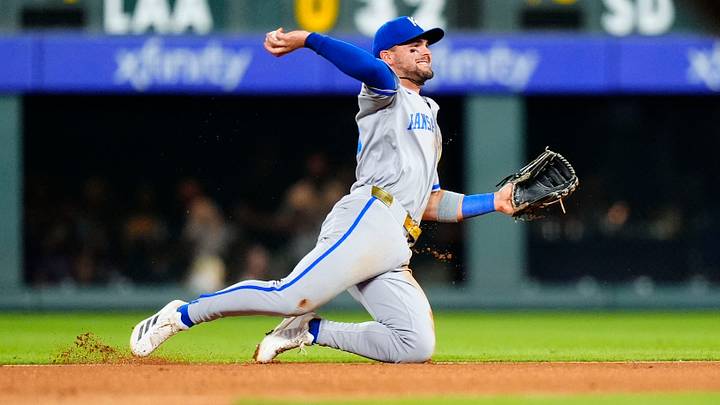 Jul 31, 2026; Denver, Colorado, USA; Kansas City Royals second baseman Michael Massey (19) fields the ball in the fifth inning against the Colorado Rockies at Coors Field. Mandatory Credit: Ron Chenoy-Imagn Images