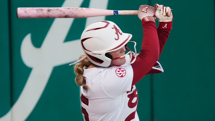 Feb 13, 2026; Tuscaloosa, AL, USA; Alabama batter Brooke Wells connects for a hit against Purdue at Rhoads Stadium in the East Bama Bash, the home opening weekend tournament.
