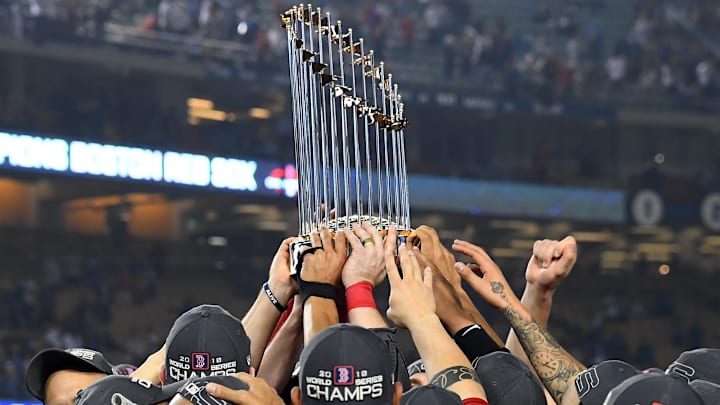 Oct 28, 2018; Los Angeles, CA, USA; Boston Red Sox players hoist the Commissioner's Trophy after game five of the 2018 World Series against the Los Angeles Dodgers at Dodger Stadium. Mandatory Credit: Jayne Kamin-Oncea-Imagn Images Oct 28, 2018; Los Angeles, CA, USA; Boston Red Sox players hoist the Commissioner's Trophy after game five of the 2018 World Series against the Los Angeles Dodgers at Dodger Stadium. Mandatory Credit: Jayne Kamin-Oncea-Imagn Images
