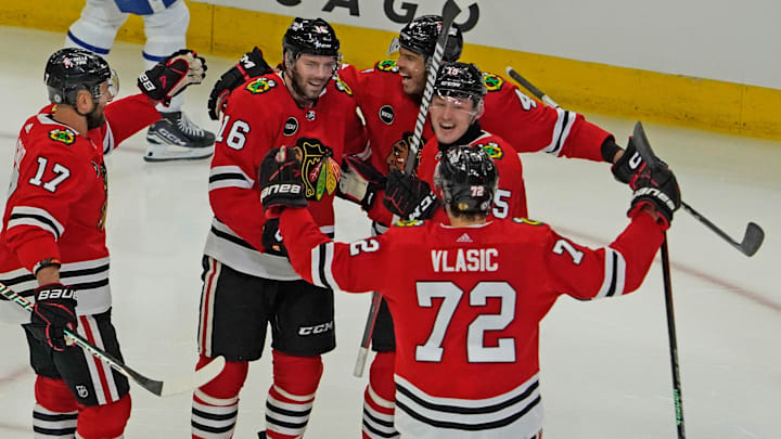 Nov 24, 2023; Chicago, Illinois, USA; Chicago Blackhawks center Jason Dickinson (16) celebrates his