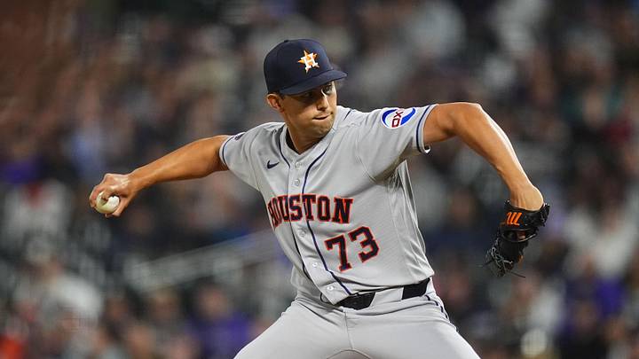 Apr 7, 2026; Denver, Colorado, USA; Houston Astros relief Christian Roa (73) delivers a pitch against the Colorado Rockies in the in the eighth inning at Coors Field. Mandatory Credit: Ron Chenoy-Imagn Images