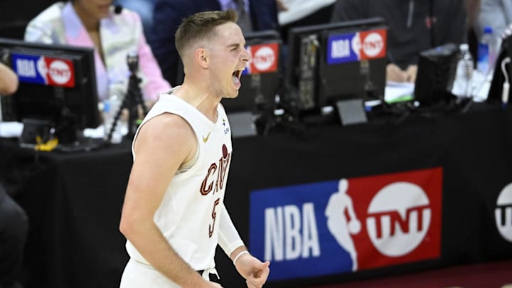 Apr 20, 2025; Cleveland, Ohio, USA; Cleveland Cavaliers guard Sam Merrill (5) celebrates his three-point basket in the fourth quarter against the Miami Heat at Rocket Arena. Mandatory Credit: David Richard-Imagn Images
