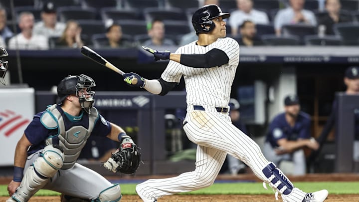 May 22, 2024; Bronx, New York, USA;  New York Yankees right fielder Juan Soto (22) hits his second home run of the game in the sixth inning against the Seattle Mariners at Yankee Stadium. Mandatory Credit: Wendell Cruz-USA TODAY Sports
