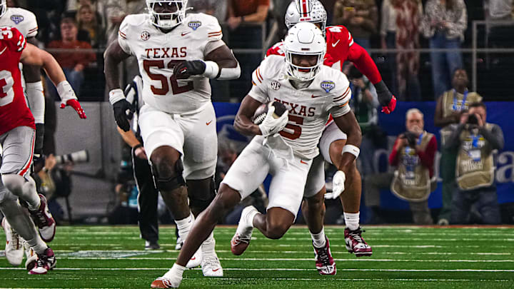 Texas Longhorns receiver Ryan Wingo (5) runs the ball during the College Football Playoff semifinal game against Ohio State in the Cotton Bowl at AT&T Stadium on Friday, Jan. 10, 2024 in Arlington, Texas. Texas Longhorns receiver Ryan Wingo (5) runs the ball during the College Football Playoff semifinal game against Ohio State in the Cotton Bowl at AT&T Stadium on Friday, Jan. 10, 2024 in Arlington, Texas.