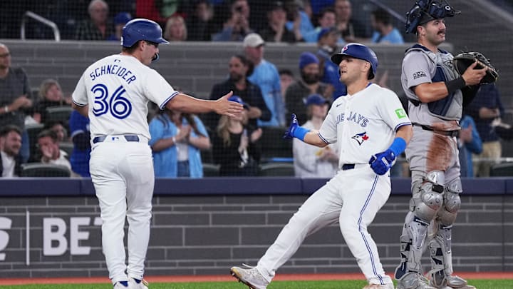 Apr 17, 2024; Toronto, Ontario, CAN; Toronto Blue Jays left fielder Daulton Varsho (25) hits a run