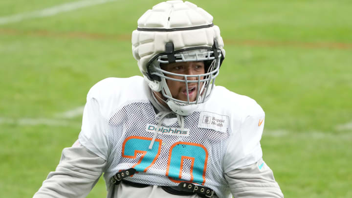 Miami Dolphins offensive tackle Kendall Lamm wears a Guardian helmet cap during practice at the PSD Bank Arena in Germany before the Week 9 game against the Kansas City Chiefs in 2023.