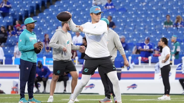 Miami Dolphins quarterback Zach Wilson (0) warms up before the game against the Buffalo Bills at Highmark Stadium in Week 3.
