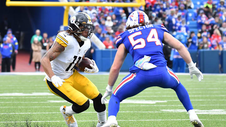 Oct 9, 2022; Orchard Park, New York, USA; Pittsburgh Steelers wide receiver Chase Claypool (11) runs with the ball against Buffalo Bills linebacker Baylon Spector (54) 
