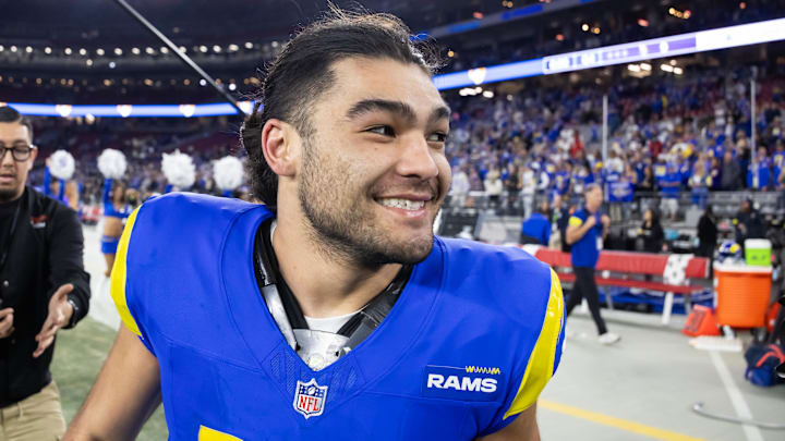 Jan 13, 2025; Glendale, AZ, USA; Los Angeles Rams wide receiver Puka Nacua (17) celebrates after defeating the Minnesota Vikings during an NFC wild card game at State Farm Stadium. Mandatory Credit: Mark J. Rebilas-Imagn Images