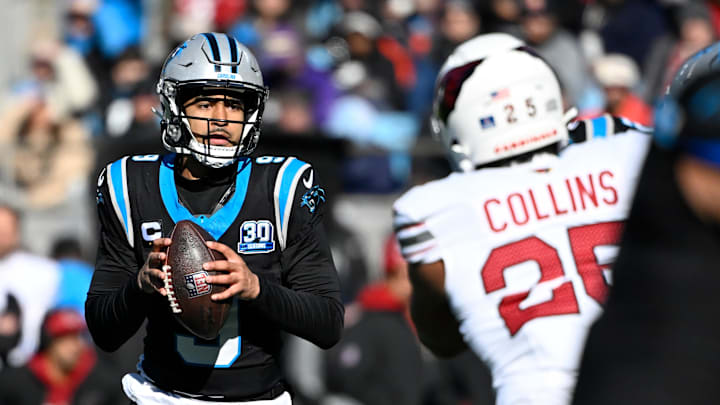 Dec 22, 2024; Charlotte, North Carolina, USA; Carolina Panthers quarterback Bryce Young (9) looks to pass as Arizona Cardinals linebacker Zaven Collins (25) defends in the first quarter at Bank of America Stadium. Mandatory Credit: Bob Donnan-Imagn Images Dec 22, 2024; Charlotte, North Carolina, USA; Carolina Panthers quarterback Bryce Young (9) looks to pass as Arizona Cardinals linebacker Zaven Collins (25) defends in the first quarter at Bank of America Stadium. Mandatory Credit: Bob Donnan-Imagn Images