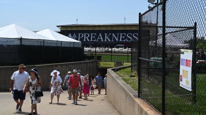 May 21, 2022; Baltimore, MD, USA;  Preakness attendees enter the infield via a tunnel at Pimlico