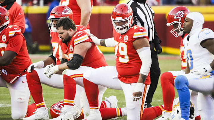 Dec 14, 2025; Kansas City, Missouri, USA; Kansas City Chiefs offensive lineman Esa Pole (79) takes a knee following an injury to quarterback Patrick Mahomes (not pictured) during the fourth quarter against the Los Angeles Chargers at GEHA Field at Arrowhead Stadium. Mandatory Credit: Denny Medley-Imagn Images Dec 14, 2025; Kansas City, Missouri, USA; Kansas City Chiefs offensive lineman Esa Pole (79) takes a knee following an injury to quarterback Patrick Mahomes (not pictured) during the fourth quarter against the Los Angeles Chargers at GEHA Field at Arrowhead Stadium. Mandatory Credit: Denny Medley-Imagn Images