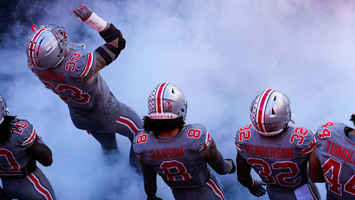 Oct 5, 2024; Columbus, Ohio, USA; Ohio State Buckeyes defensive end Jack Sawyer (33), safety Lathan Ransom (8), running back TreVeyon Henderson (32) prepare to take the field before the game against the Iowa Hawkeyes on Saturday.