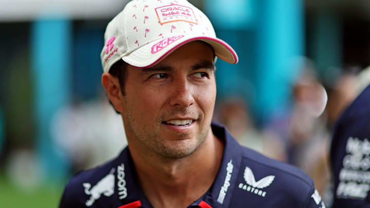 May 5, 2024; Miami Gardens, Florida, USA; Red Bull Racing driver Sergio Perez (11) walks in the paddock before the F1 Miami Grand Prix at Miami International Autodrome. Mandatory Credit: Peter Casey-USA TODAY Sports