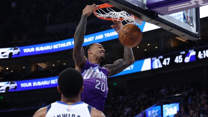 Nov 14, 2024; Salt Lake City, Utah, USA; Utah Jazz forward John Collins (20) dunks the ball against the Dallas Mavericks during the second quarter at Delta Center. Mandatory Credit: Rob Gray-Imagn Images