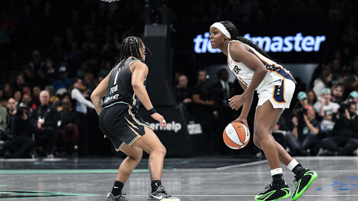 Apr 25, 2026; Brooklyn, NY, USA; Indiana Fever guard Raven Johnson (3) sets the play while defended by New York Liberty guard Ny'ceara Pryor (1) during the first half at Barclays Center. Mandatory Credit: John Jones-Imagn Images