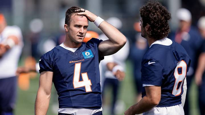 Denver Broncos quarterback Sam Ehlinger (4) and quarterback Jarrett Stidham (8) during Denver Broncos Training Camp. Denver Broncos quarterback Sam Ehlinger (4) and quarterback Jarrett Stidham (8) during Denver Broncos Training Camp.