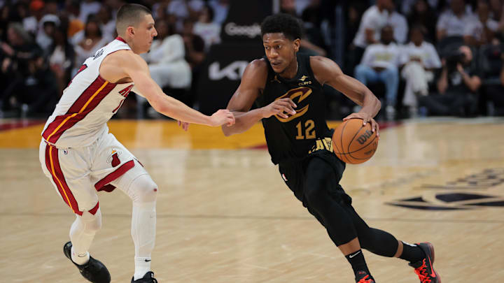 Apr 26, 2025; Miami, Florida, USA; Cleveland Cavaliers forward De'Andre Hunter (12) drives to the basket against Miami Heat guard Tyler Herro (14) in the fourth quarter during game three for the first round of the 2025 NBA Playoffs at Kaseya Center. Mandatory Credit: Sam Navarro-Imagn Images Apr 26, 2025; Miami, Florida, USA; Cleveland Cavaliers forward De'Andre Hunter (12) drives to the basket against Miami Heat guard Tyler Herro (14) in the fourth quarter during game three for the first round of the 2025 NBA Playoffs at Kaseya Center. Mandatory Credit: Sam Navarro-Imagn Images