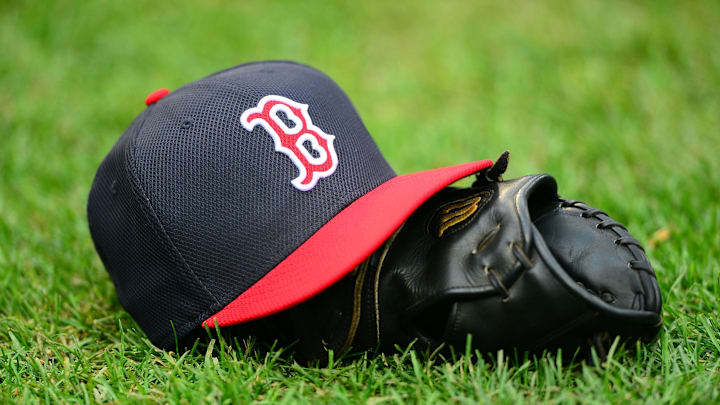 Oct 15, 2013; Detroit, MI, USA; A Boston Red Sox hat and glove on the field prior to game three of the American League Championship Series baseball game against the Detroit Tigers at Comerica Park. Mandatory Credit: Andrew Weber-Imagn Images Oct 15, 2013; Detroit, MI, USA; A Boston Red Sox hat and glove on the field prior to game three of the American League Championship Series baseball game against the Detroit Tigers at Comerica Park. Mandatory Credit: Andrew Weber-Imagn Images