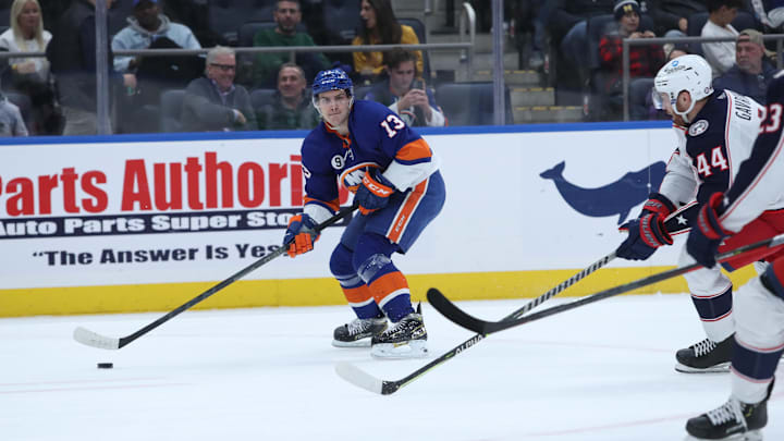 Mar 31, 2022; Elmont, New York, USA; New York Islanders center Mathew Barzal (13) skates with the