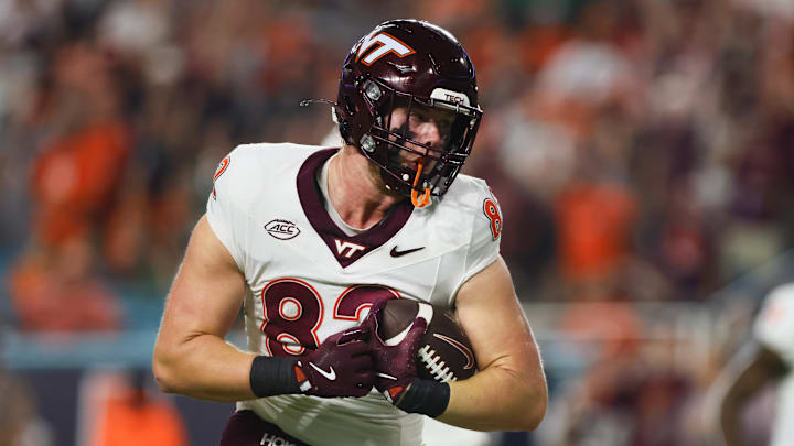 Sep 27, 2024; Miami Gardens, Florida, USA; Virginia Tech Hokies tight end Benji Gosnell (82) catches the football for a touchdown against the Miami Hurricanes during the first quarter at Hard Rock Stadium. Mandatory Credit: Sam Navarro-Imagn Images