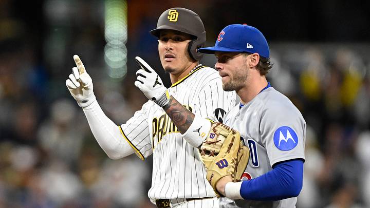 Apr 27, 2026; San Diego, California, USA; San Diego Padres third baseman Manny Machado (13) gestures after hitting a double as Chicago Cubs second baseman Nico Hoerner (2) looks on during the third inning at Petco Park. Mandatory Credit: Denis Poroy-Imagn Images Apr 27, 2026; San Diego, California, USA; San Diego Padres third baseman Manny Machado (13) gestures after hitting a double as Chicago Cubs second baseman Nico Hoerner (2) looks on during the third inning at Petco Park. Mandatory Credit: Denis Poroy-Imagn Images