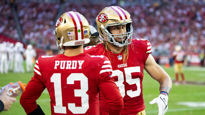 Dec 17, 2023; Glendale, Arizona, USA; San Francisco 49ers tight end George Kittle (85) with quarterback Brock Purdy (13) against the Arizona Cardinals at State Farm Stadium. Mandatory Credit: Mark J. Rebilas-USA TODAY Sports