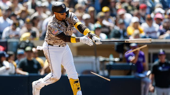 Apr 13, 2025; San Diego, California, USA; San Diego Padres first baseman Yuli Gurriel (10) breaks his bat on a swing during the third inning against the Colorado Rockies at Petco Park. Mandatory Credit: David Frerker-Imagn Images