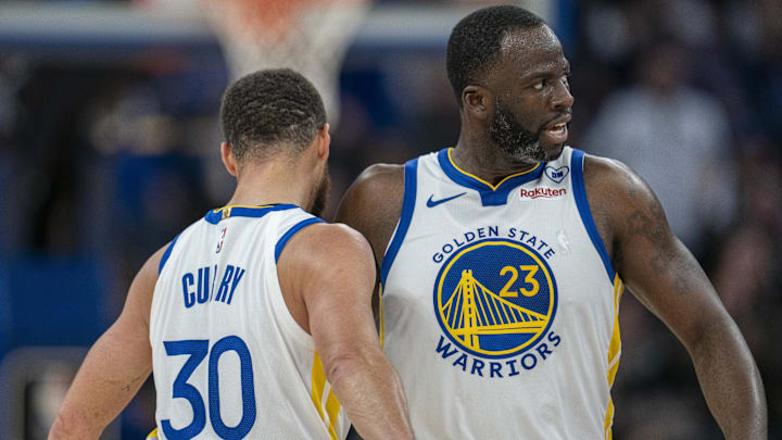 Jan 30, 2024; San Francisco, California, USA;  Golden State Warriors guard Stephen Curry (30) and forward Draymond Green (23) celebrate after the three point basket against the Philadelphia 76ers during the third quarter at Chase Center. Mandatory Credit: Neville E. Guard-Imagn Images