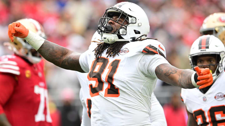 Oct 15, 2023; Cleveland, Ohio, USA; Cleveland Browns defensive end Alex Wright (91) celebrates after a play during the second half against the San Francisco 49ers at Cleveland Browns Stadium. Mandatory Credit: Ken Blaze-USA TODAY Sports
