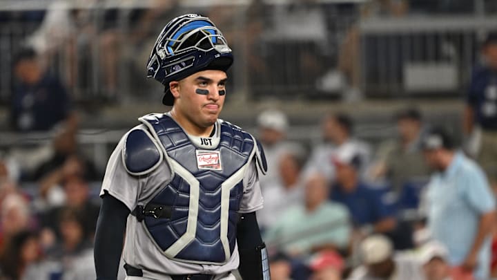 New York Yankees catcher Jose Trevino walks back the the dugout against the Washington Nationals.