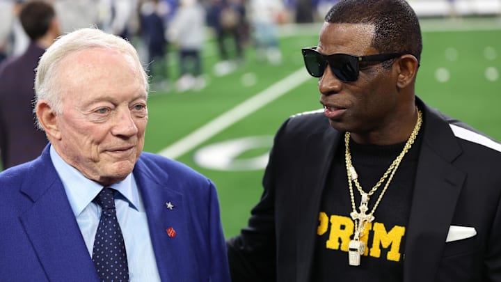 Nov 30, 2023; Arlington, Texas, USA; Colorado Buffaloes head coach Deion Sanders (right) talks with