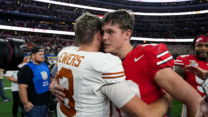 Ohio State quarterback Will Howard (18) meets Texas Longhorns quarterback Quinn Ewers (3) after the College Football Playoff semifinal game in the Cotton Bowl at AT&T Stadium on Friday, Jan. 10, 2024 in Arlington, Texas. Ohio State beat Texas 28-14 to advance to the National Championship.