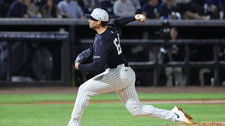 Mar 7, 2025; Tampa, Florida, USA;  New York Yankees pitcher Geoff Hartlieb (64) throws a pitch during the fourth inning against the Toronto Blue Jays at George M. Steinbrenner Field. Mandatory Credit: Kim Klement Neitzel-Imagn Images