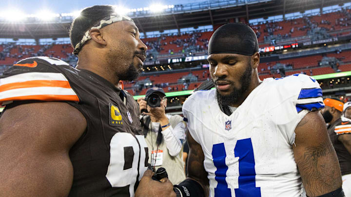 Sep 8, 2024; Cleveland, Ohio, USA; Cleveland Browns defensive end Myles Garrett (95) congratulates Dallas Cowboys linebacker Micah Parsons (11) after the game at Huntington Bank Field. Mandatory Credit: Scott Galvin-Imagn Images