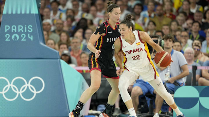 Aug 7, 2024; Paris, France; Spain small forward Maria Conde (22) dribbles against Belgium small forward Antonia Delaere (6) in the first quarter during the Paris 2024 Olympic Summer Games at Accor Arena. Mandatory Credit: Kyle Terada-Imagn Images