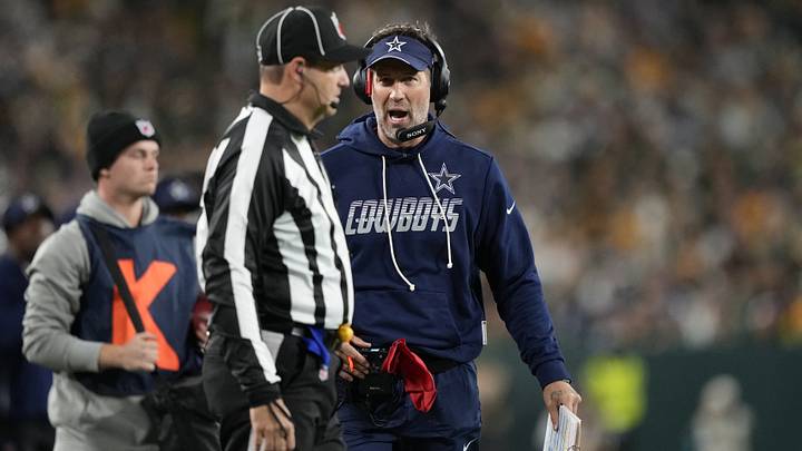 Dallas Cowboys head coach Brian Schottenheimer talks with an official during the first half of the game against the Green Bay Packers at Lambeau Field. Mandatory Credit: Jeff Hanisch-Imagn Images Dallas Cowboys head coach Brian Schottenheimer talks with an official during the first half of the game against the Green Bay Packers at Lambeau Field. Mandatory Credit: Jeff Hanisch-Imagn Images
