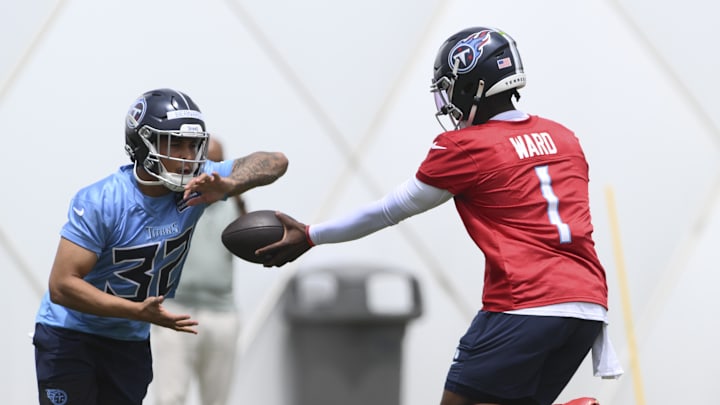 May 10, 2025; Nashville, TN, USA;  Tennessee Titans quarterback Cam Ward (1) goes through drills during Rookie Mini Camp at Saint Thomas Sports Park. Mandatory Credit: Steve Roberts-Imagn Images