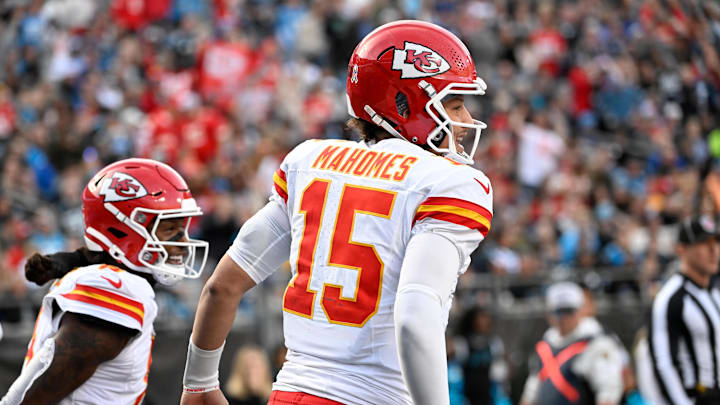 Nov 24, 2024; Charlotte, North Carolina, USA; Kansas City Chiefs wide receiver DeAndre Hopkins (8) celebrates with quarterback Patrick Mahomes (15) after scoring a touchdown in the third quarter at Bank of America Stadium.