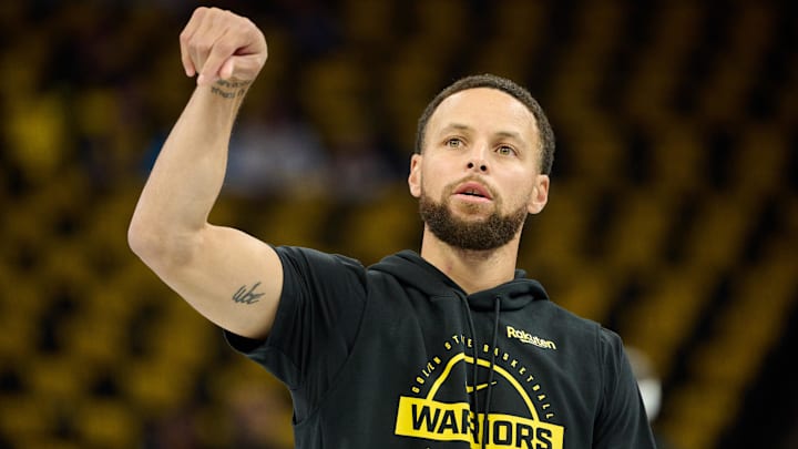 Golden State Warriors guard Stephen Curry (30) warms up before the game against the Portland Trail Blazers at Chase Center.