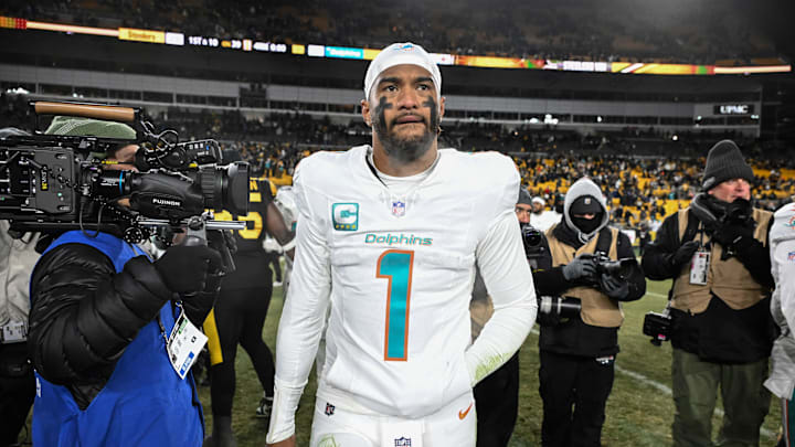 Dec 15, 2025; Pittsburgh, Pennsylvania, USA; Miami Dolphins quarterback Tua Tagovailoa (1) leaves the field following a game against the Pittsburgh Steelers at Acrisure Stadium. Dec 15, 2025; Pittsburgh, Pennsylvania, USA; Miami Dolphins quarterback Tua Tagovailoa (1) leaves the field following a game against the Pittsburgh Steelers at Acrisure Stadium.