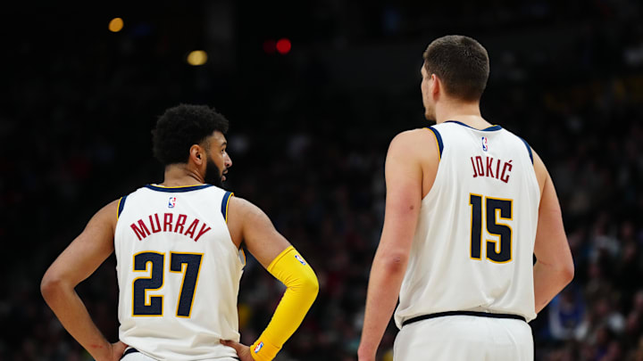 Nov 22, 2022; Denver, Colorado, USA; Denver point guard Jamal Murray (27) and center Nikola Jokic (15) talk in the fourth quarter against the Detroit Pistons. Nov 22, 2022; Denver, Colorado, USA; Denver point guard Jamal Murray (27) and center Nikola Jokic (15) talk in the fourth quarter against the Detroit Pistons.