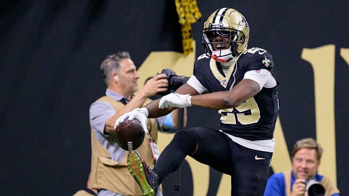 Oct 13, 2024; New Orleans, Louisiana, USA; New Orleans Saints cornerback Paulson Adebo (29) celebrates an interception during the second quarter against the Tampa Bay Buccaneers at Caesars Superdome.  