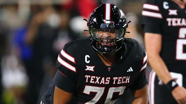 Sep 28, 2024; Lubbock, Texas, USA;  Texas Tech Red Raiders offensive lineman Caleb Rogers (76) reacts in the second half during the game against the Cincinnati Bearcats at Jones AT&T Stadium and Cody Campbell Field. Mandatory Credit: Michael C. Johnson-Imagn Images